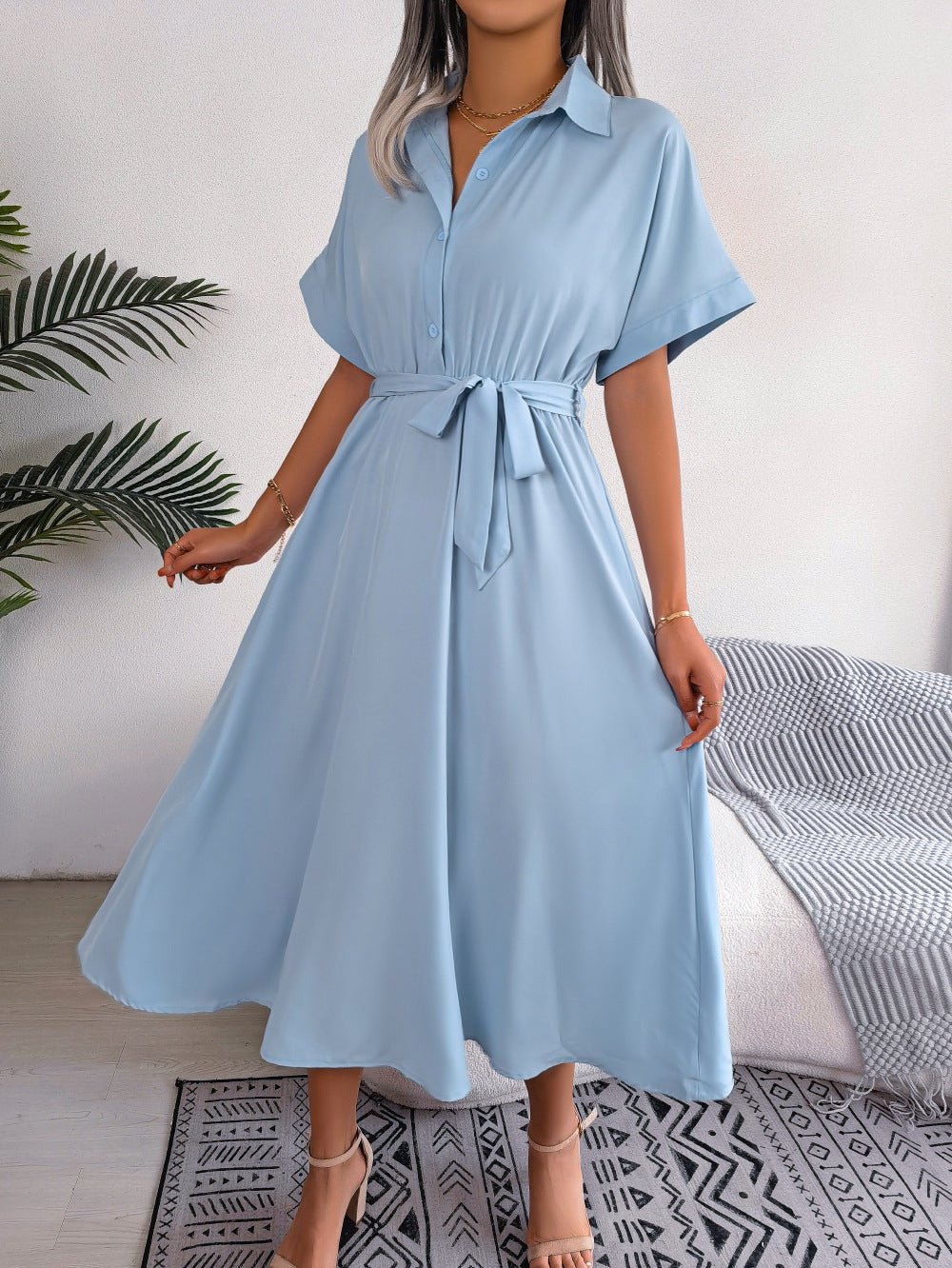 Light blue short-sleeve collared tie belt dress with button front and full midi skirt