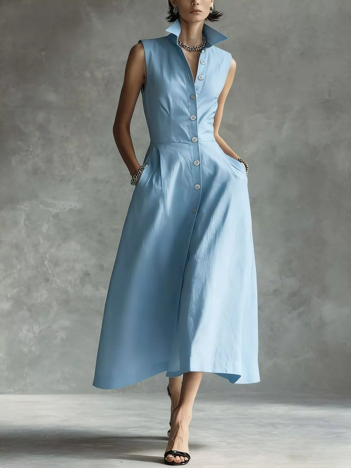 Light blue sleeveless midi button shirt dress with collar and front buttons