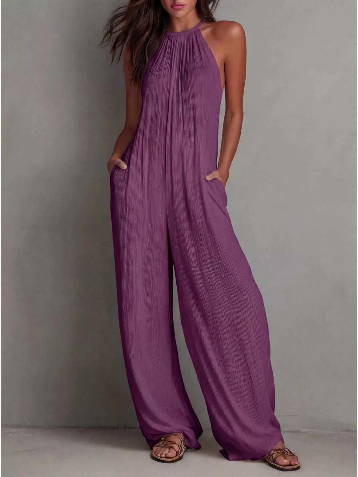 Sleeveless wide-leg jumpsuit in purple, halter neckline with gathered pleats, wide-leg fit