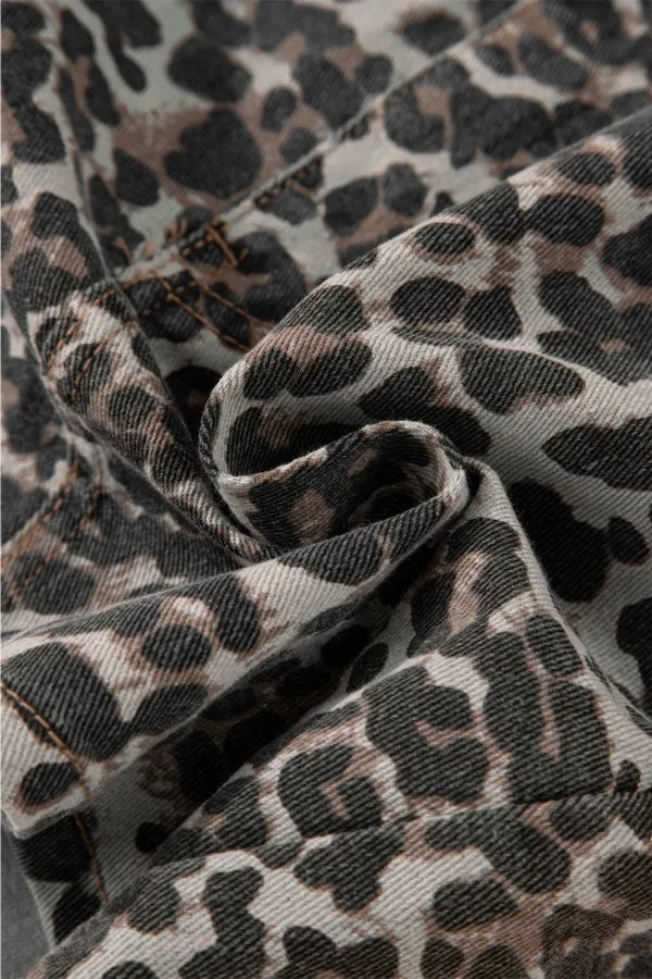 Leopard-print denim mini skirt fabric close-up with woven texture