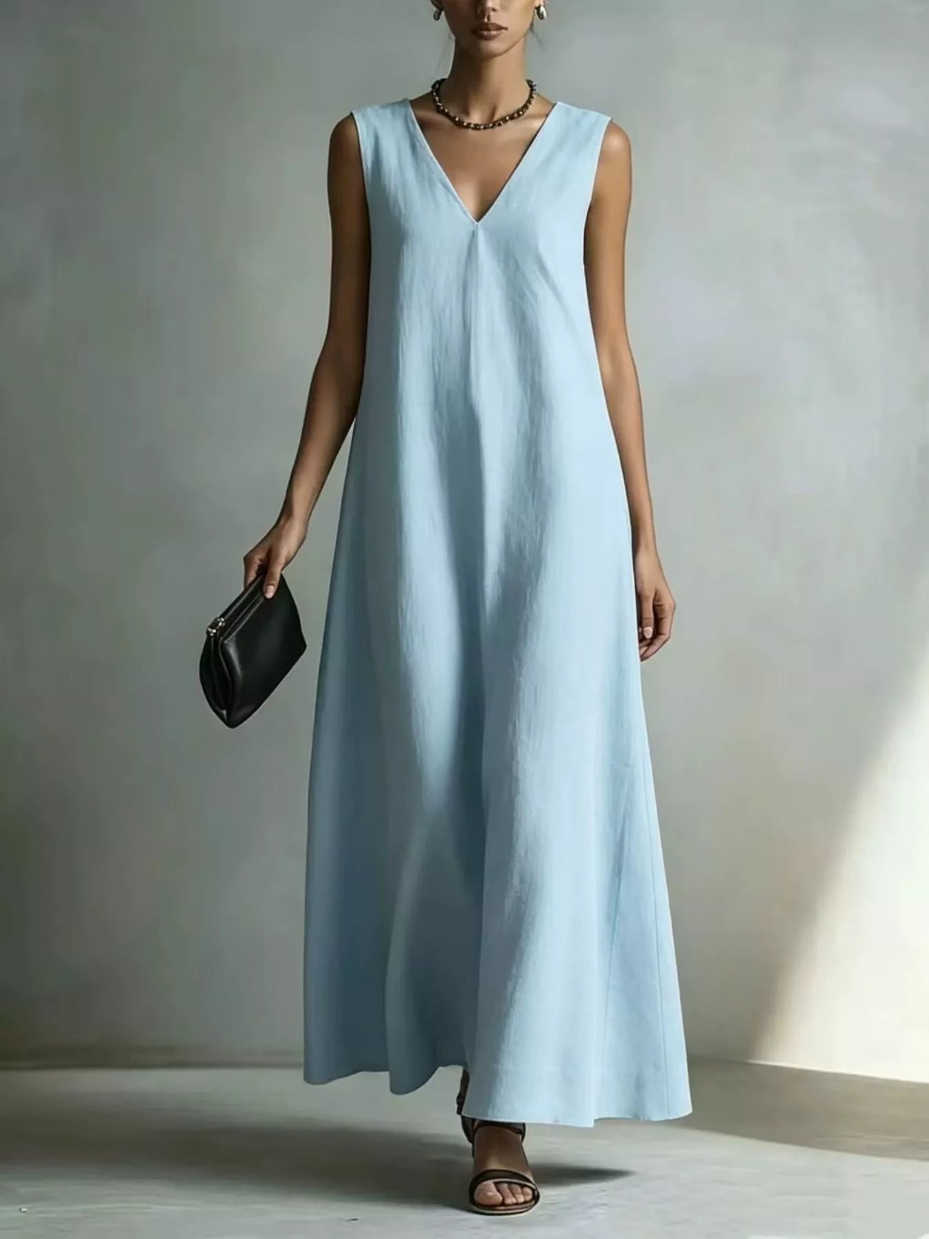 Light blue V-neck sleeveless maxi dress, flowing drape, sleeveless