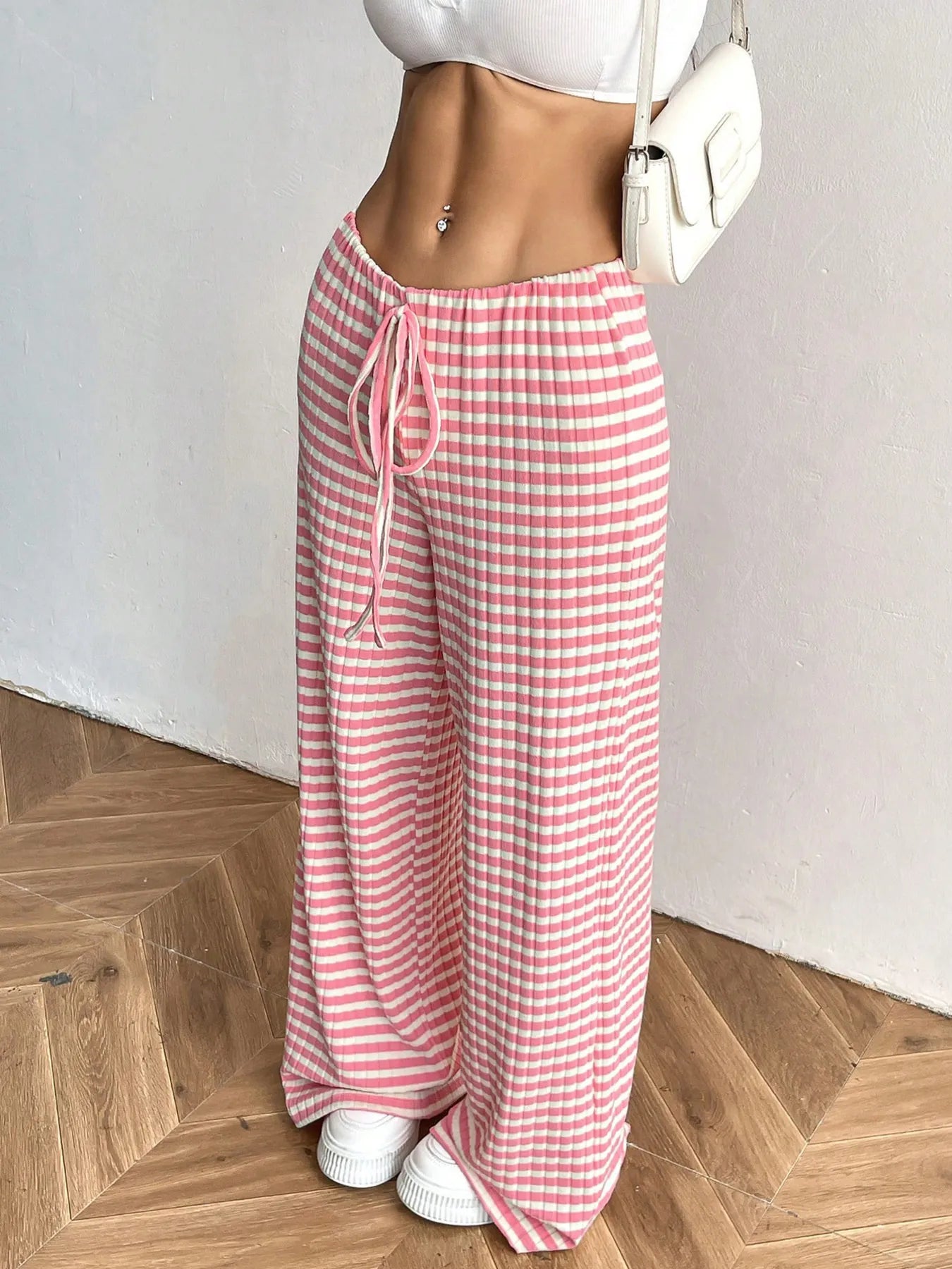 Striped wide-leg drawstring pants, pink and white horizontal stripes, flowing wide legs