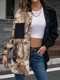 Collared contrast shirt with dropped shoulders, black top and beige patterned front panels