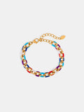 Gold-tone chain bracelet with multicolor oil drip links and lobster clasp