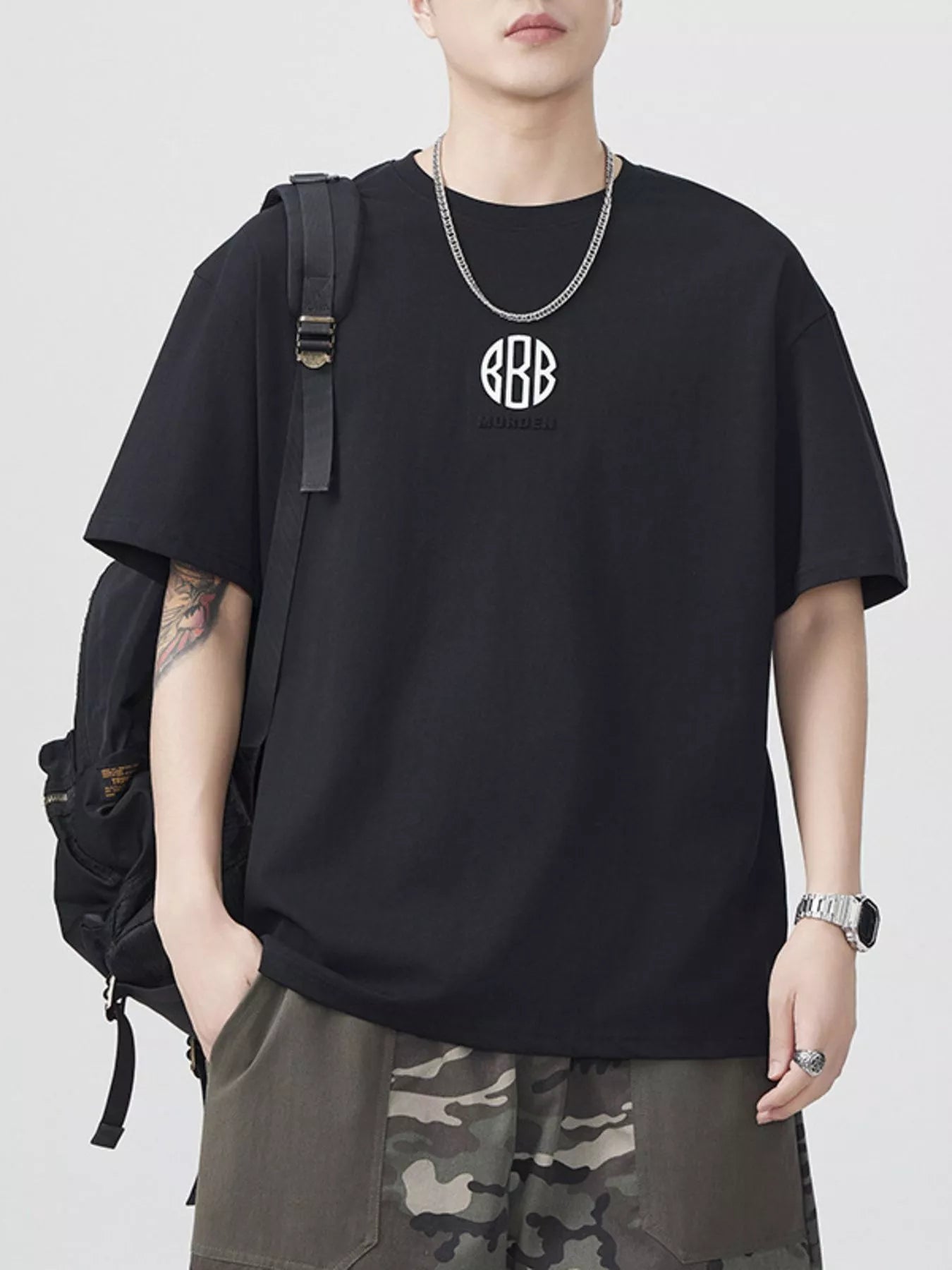 Black front-view round-neck short-sleeve T-shirt with chest logo