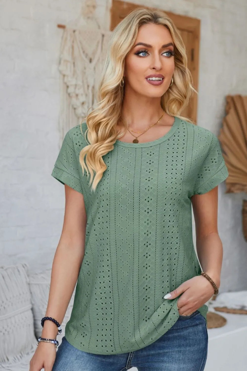 Sage green eyelet round-neck rolled short-sleeve T-shirt with vertical cutout detail