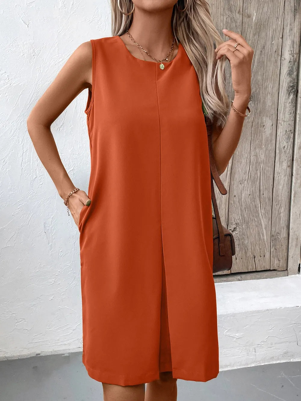 Ivy Lane pocketed round-neck sleeveless mini dress in rust orange