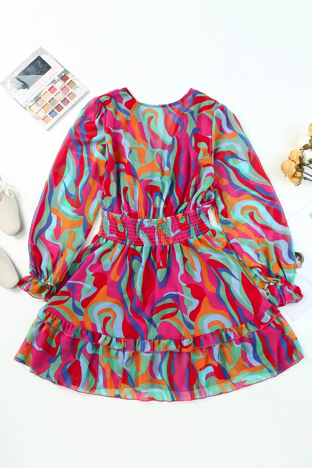 Printed flounce-sleeve mini dress in a multicolor abstract print with a smocked waist