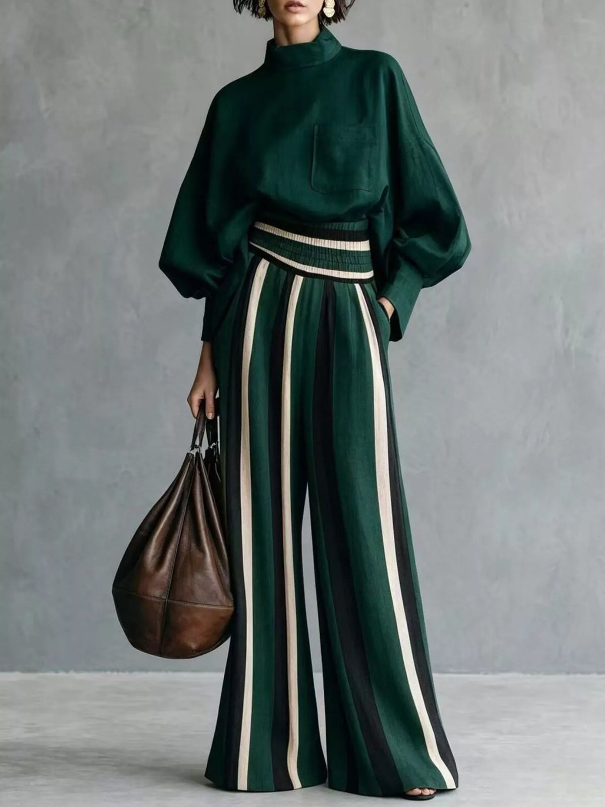 Two-piece striped set with dark green mock neck blouse and cream-green wide-leg pants