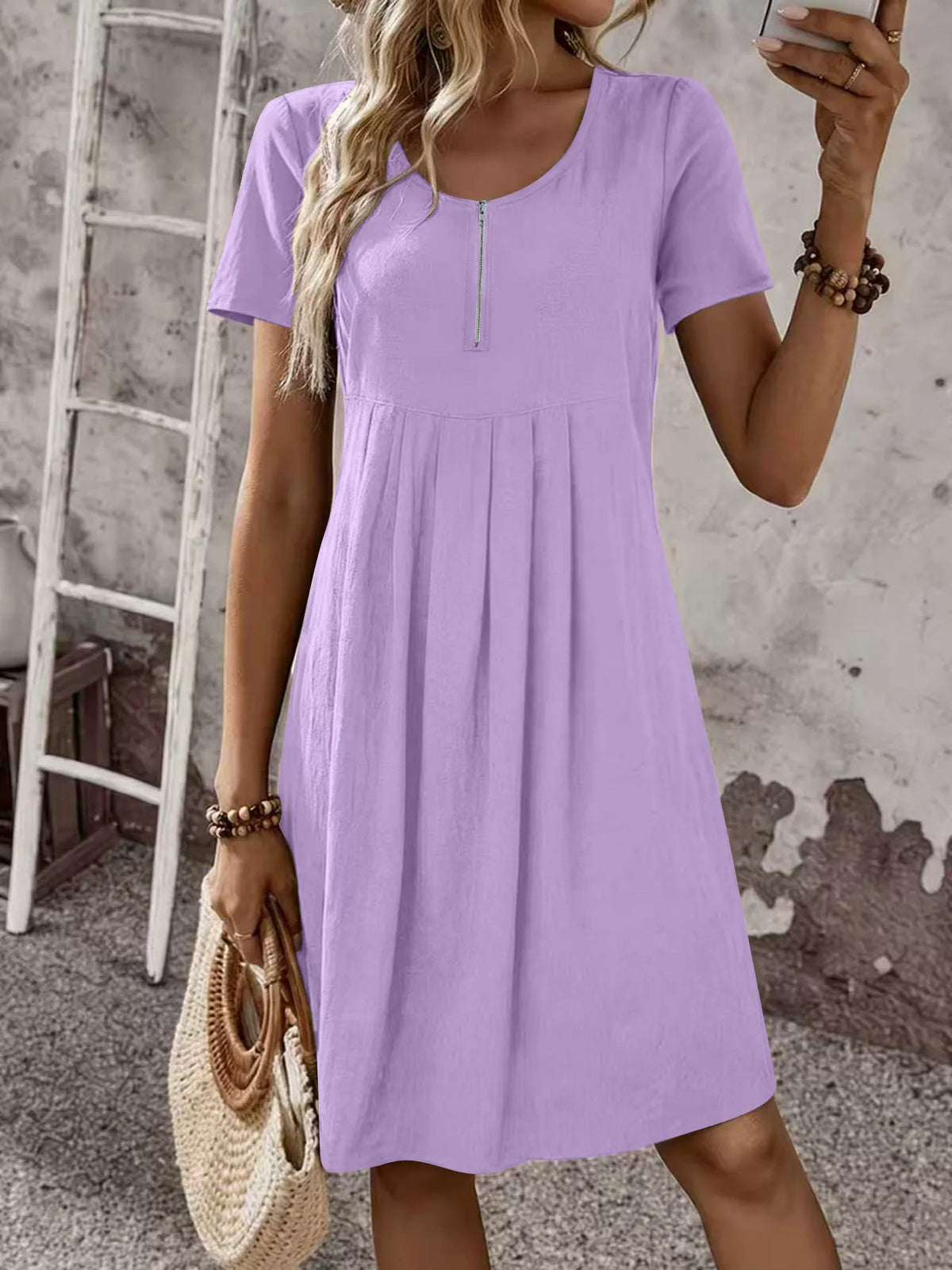 Lavender zipper-front short-sleeve pleated dress with scoop neckline, full front view