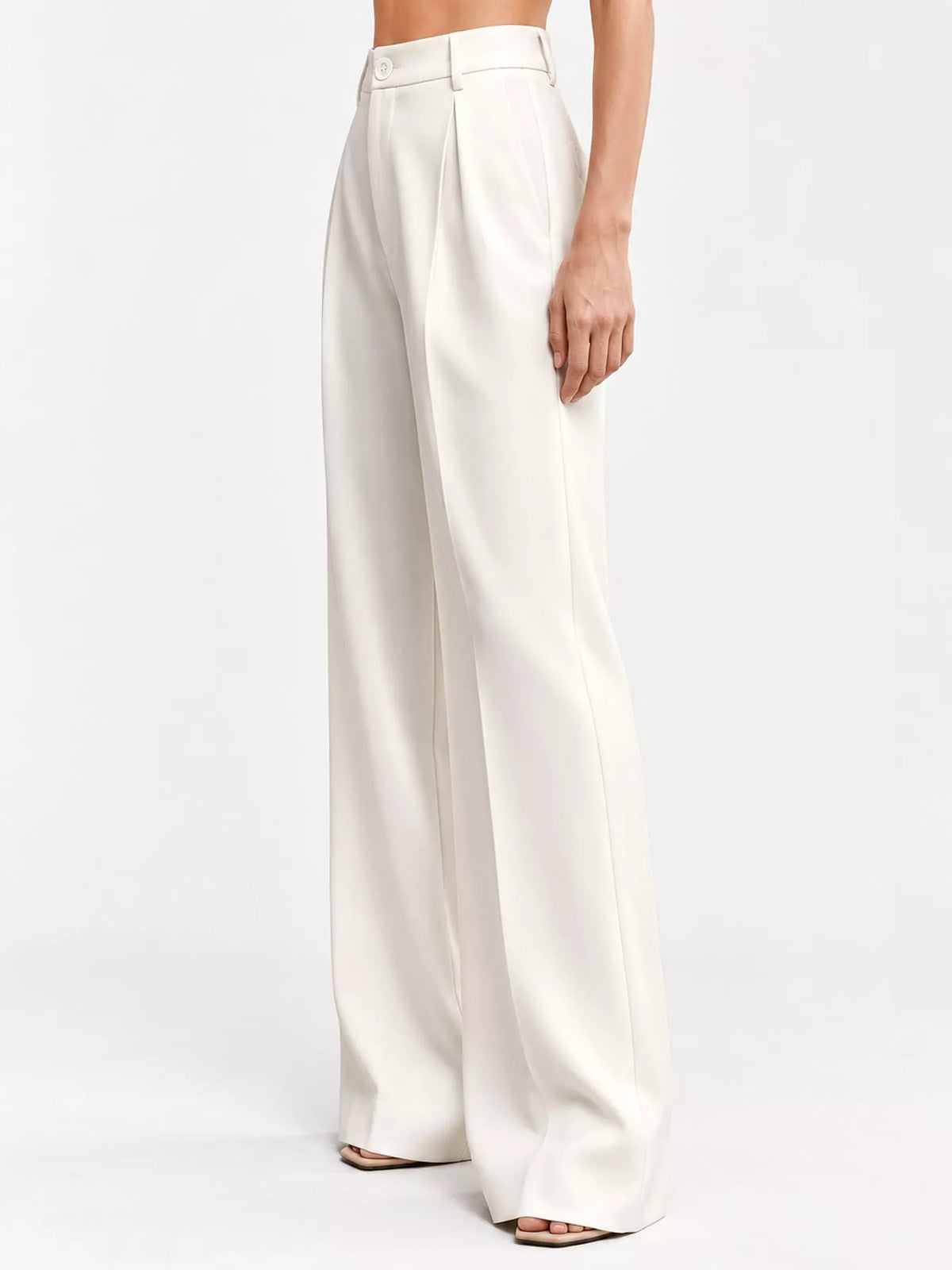 Off-white high-waisted pleated wide-leg pants, full length front view
