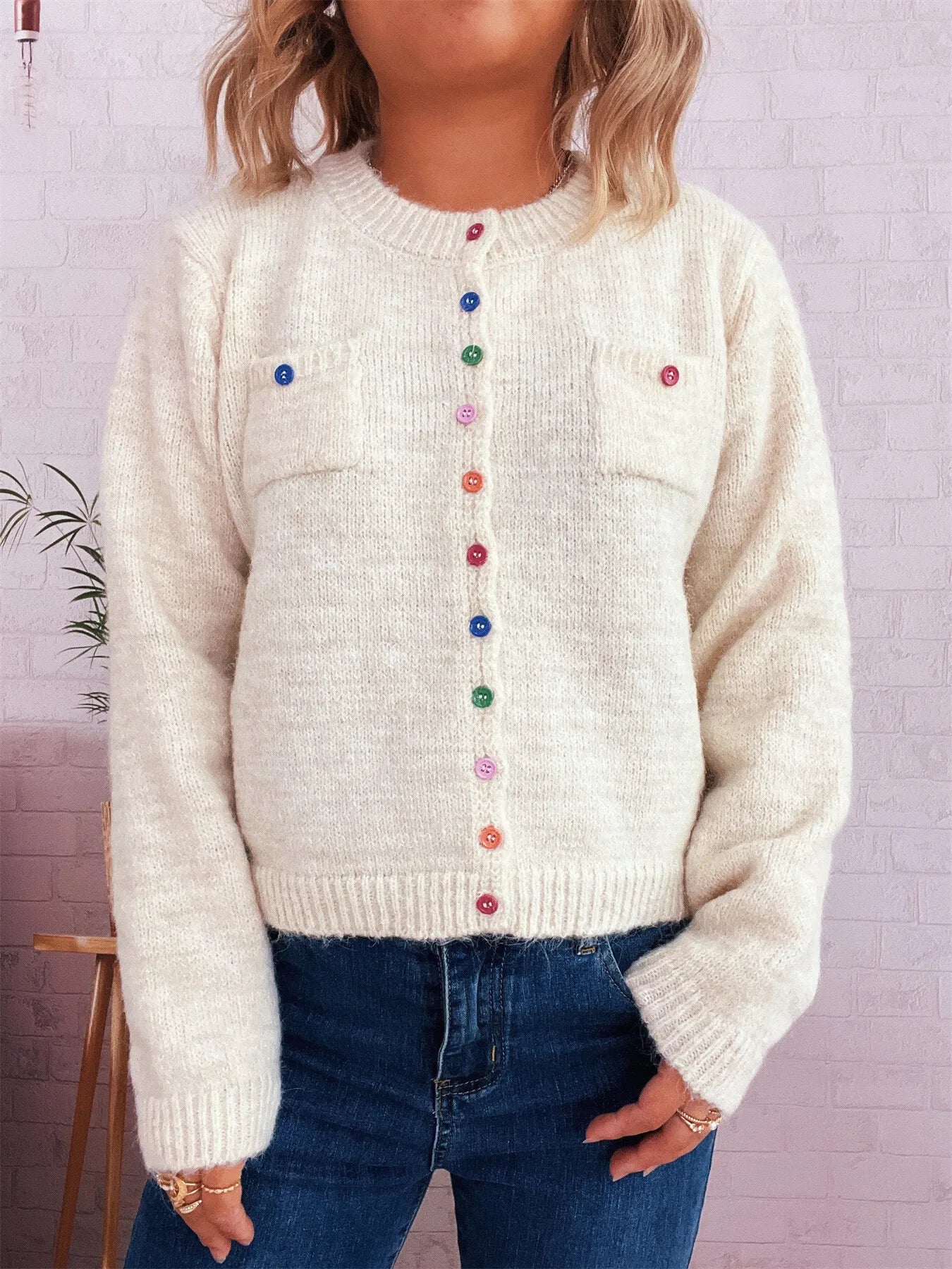 Cream button-up ribbed hem cardigan with chest pockets and multicolor button placket