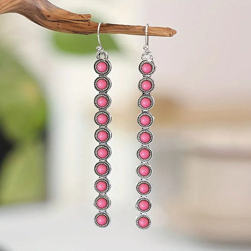 Pink cabochon drop dangle earrings with silver-tone frame, long line of discs