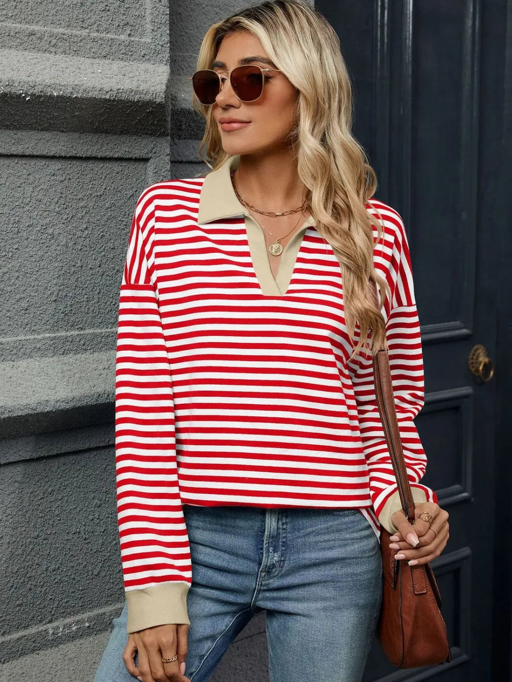 Red-and-white striped Johnny collar sweatshirt with long sleeves and split neckline
