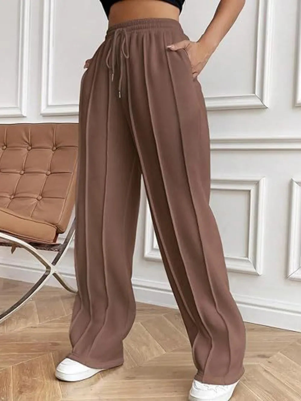 Brown wide-leg pants with drawstring waistband and side pockets