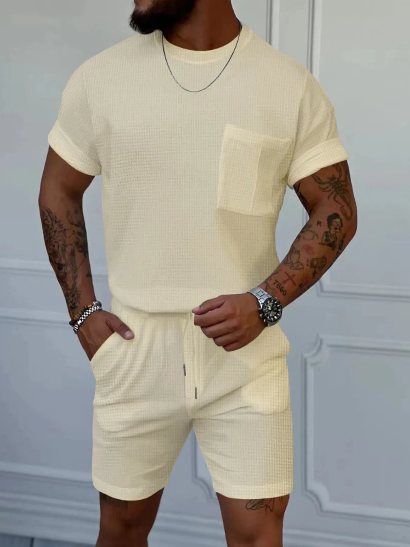 Men's light beige short-sleeve round-neck top and shorts set with chest pocket
