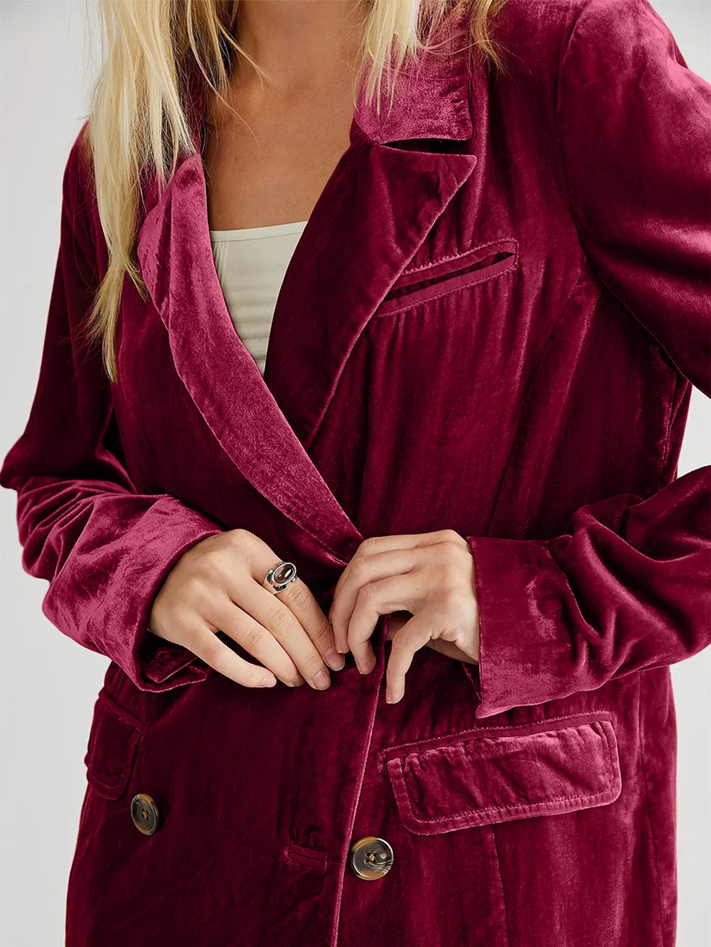 Burgundy corduroy blazer close-up with notch lapel and front pocket flap