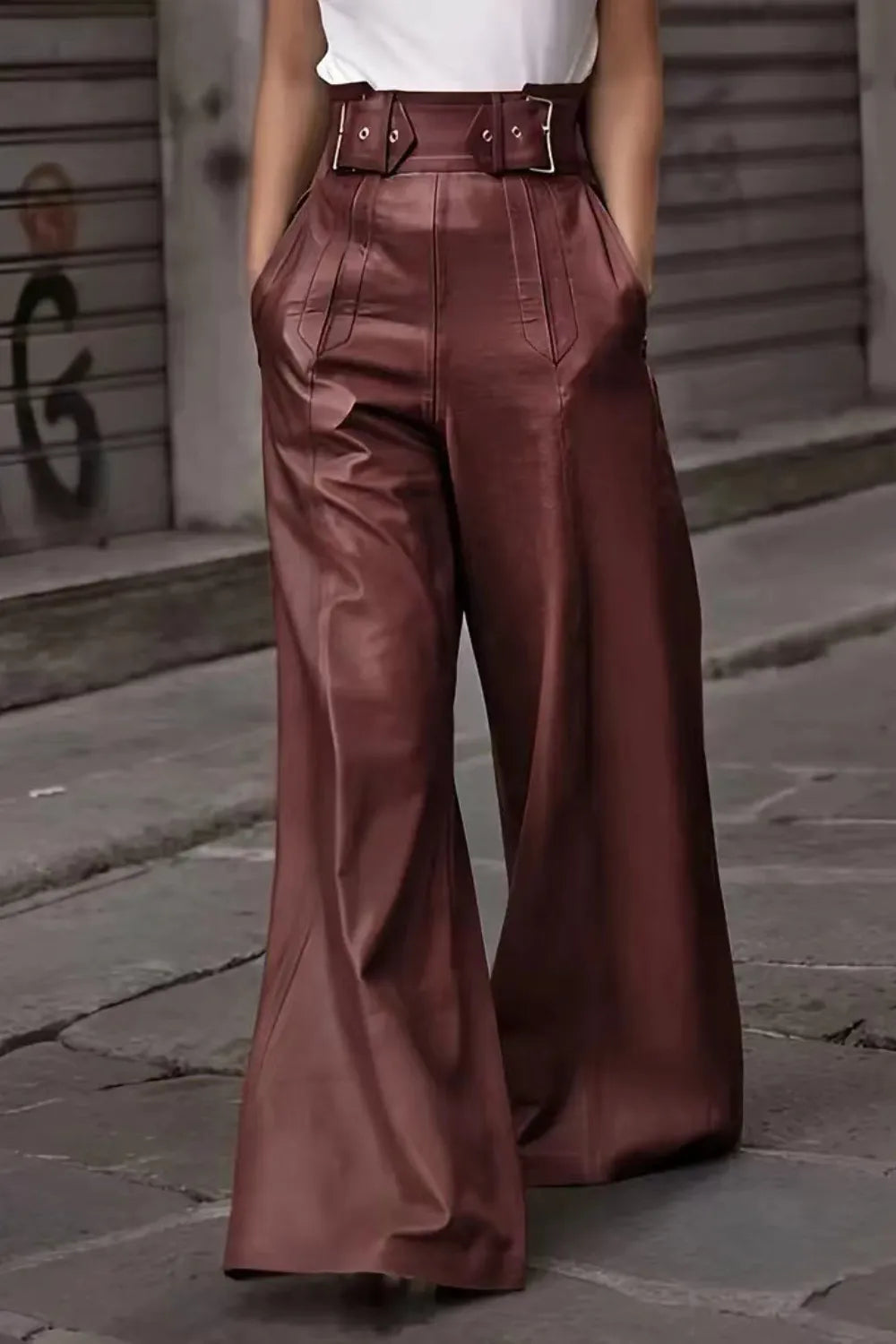 High-waist wide flare pants, burgundy, with belt buckles and front seam details