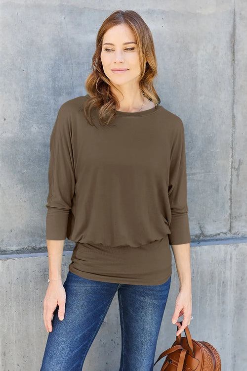 Brown round-neck batwing sleeve top with gathered knot at the hem