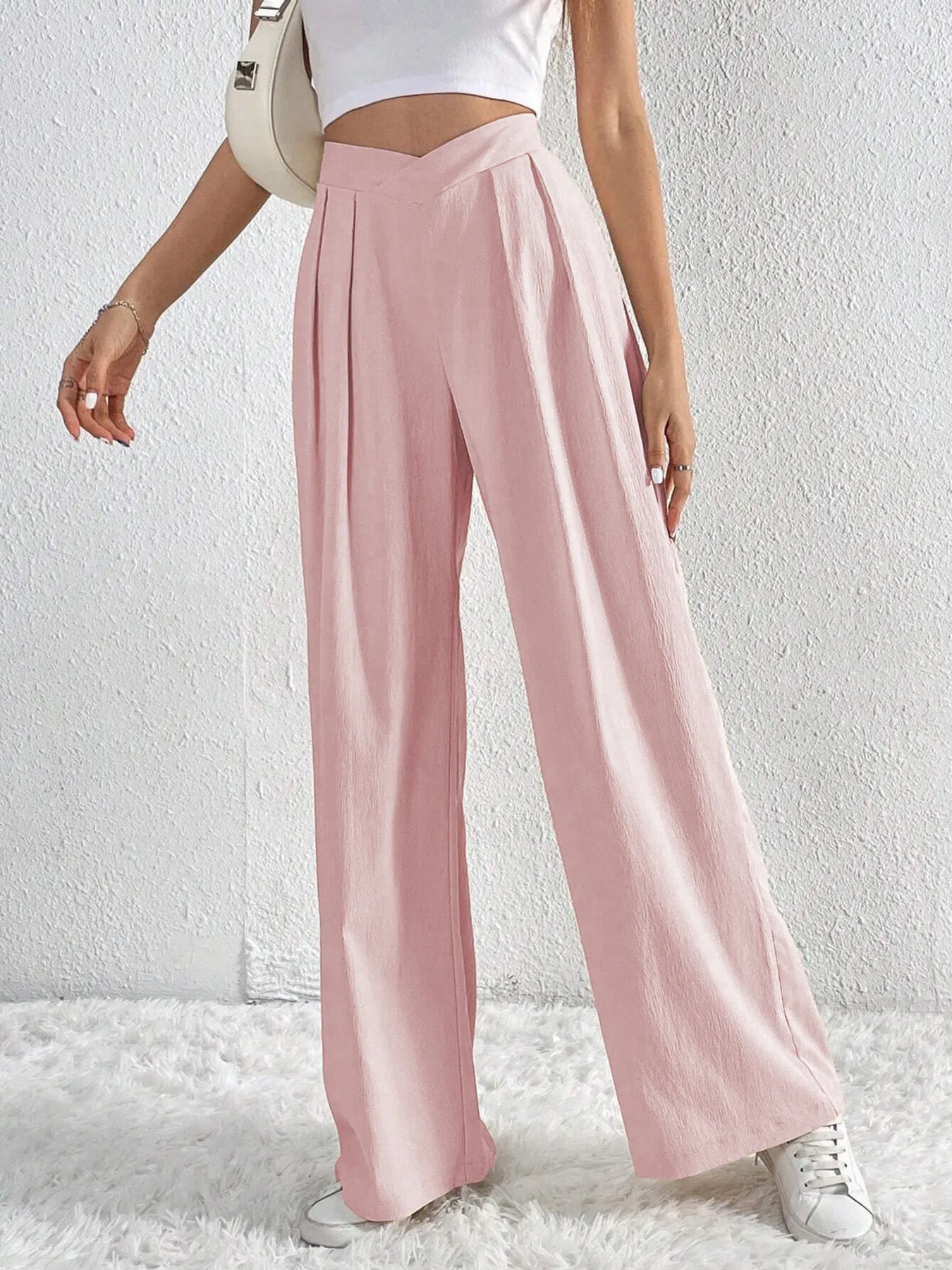 Dusty pink wide-leg pants with gathered ruched front V-waist