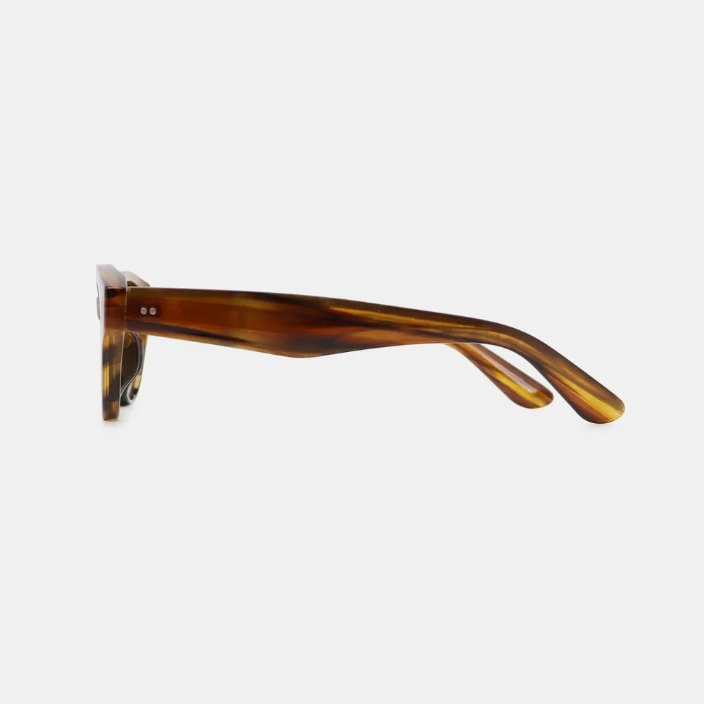 Brown polycarbonate cat-eye sunglasses side view with curved temple arms
