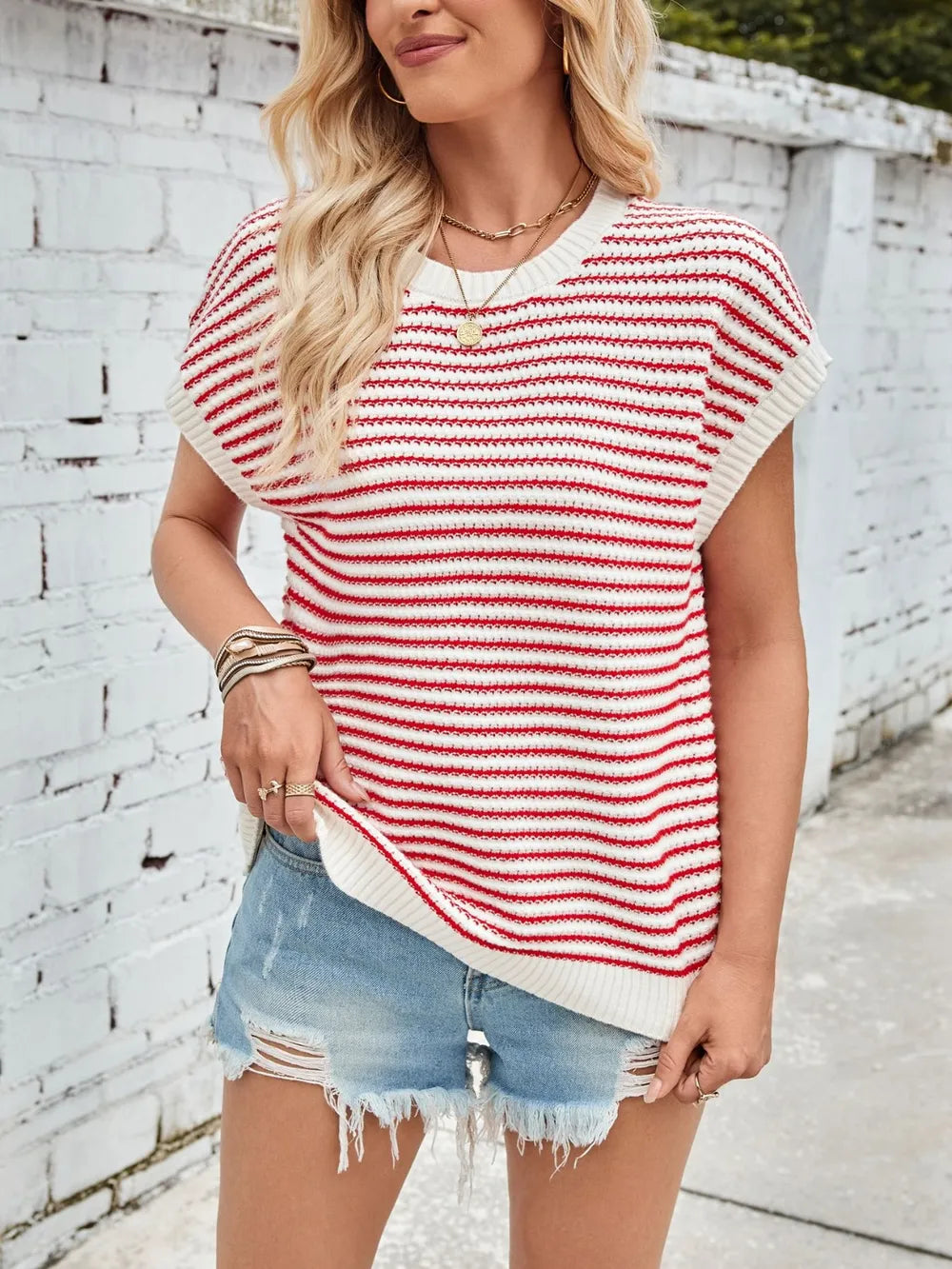 Red-and-white striped cap-sleeve sweater with round neck and white ribbed hem