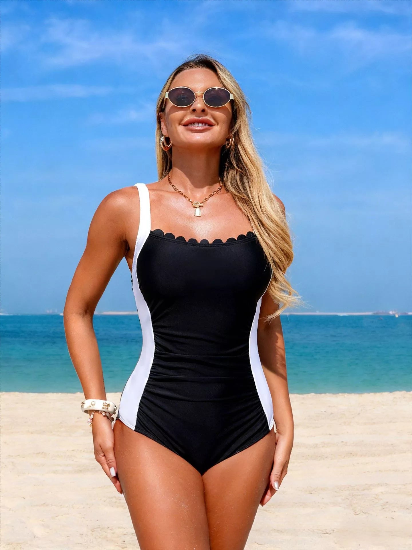 Two-Tone Ruched One-Piece Swimsuit in black with white side panels, Trendsi