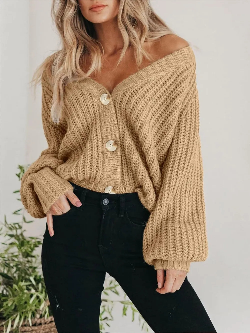 Off-shoulder style button-up long-sleeve cardigan in light tan chunky knit