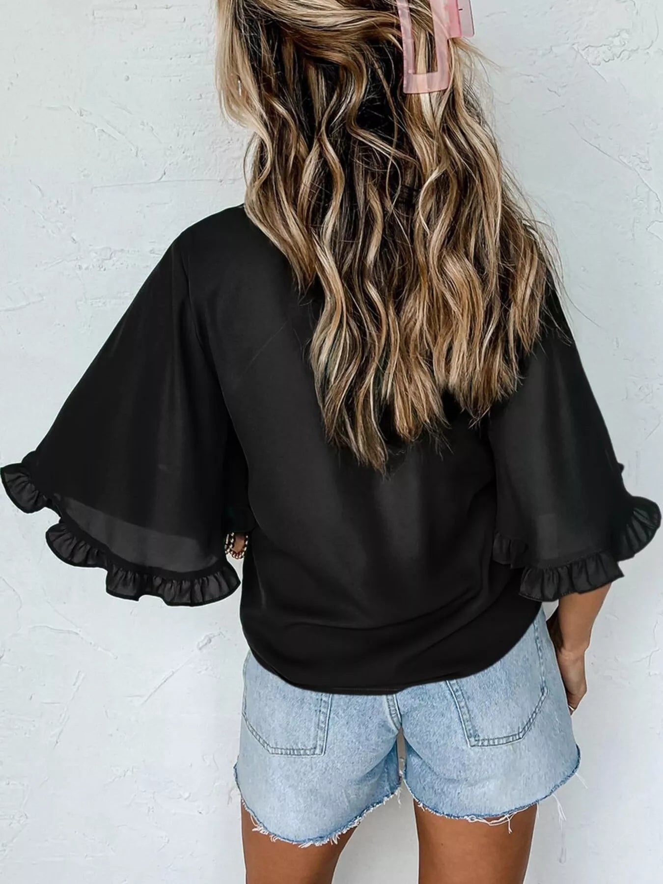 Ruffle Trim Half Sleeve Blouse in black with voluminous bell sleeves