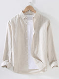 Cream short-sleeve button-up shirt with point collar and front button placket