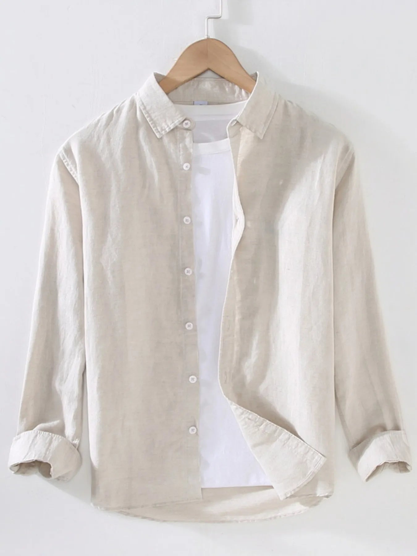 Cream short-sleeve button-up shirt with point collar and front button placket