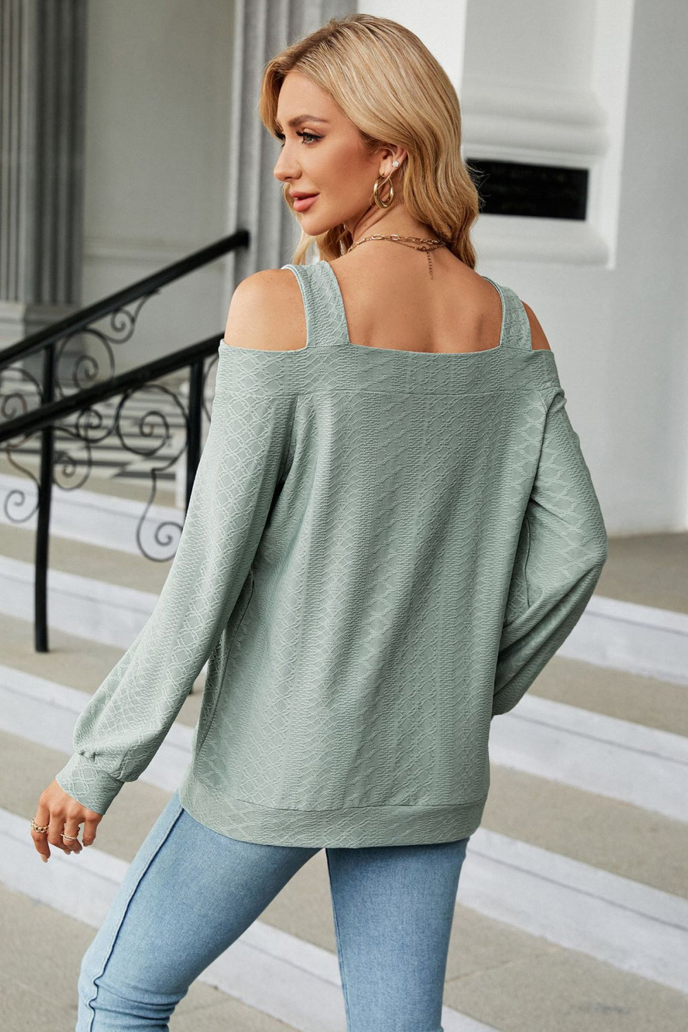 Sage green cold-shoulder blouse with wide off-shoulder cutouts and long sleeves