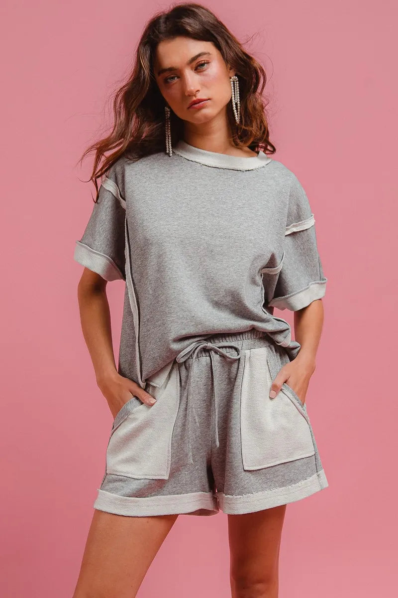 Heather grey French terry knit shorts with drawstring waist and side pocket details