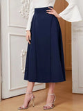 Dark blue A-line midi skirt with flared hem