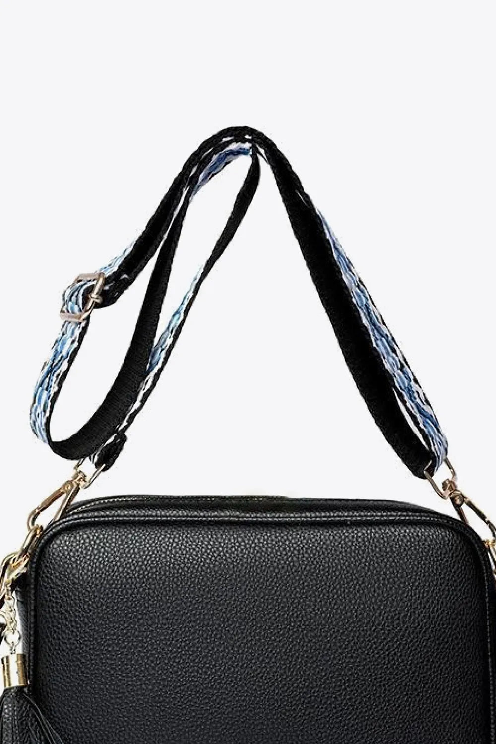 PU leather tassel crossbody bag, black top view with textured finish and gold-tone accents