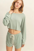 Sage green boat-neck long-sleeve cropped top with relaxed fit