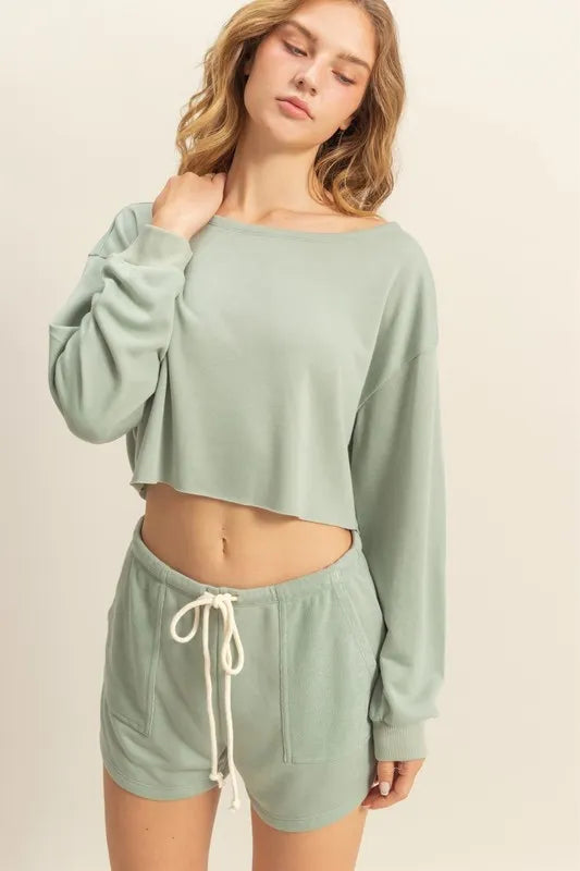 Sage green boat-neck long-sleeve cropped top with relaxed fit