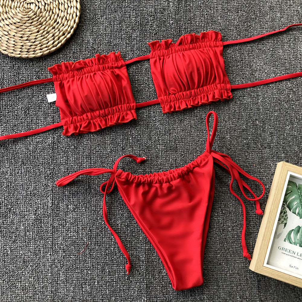 Red ruched bikini set with frill trim: bandeau top and tie-side bikini bottoms