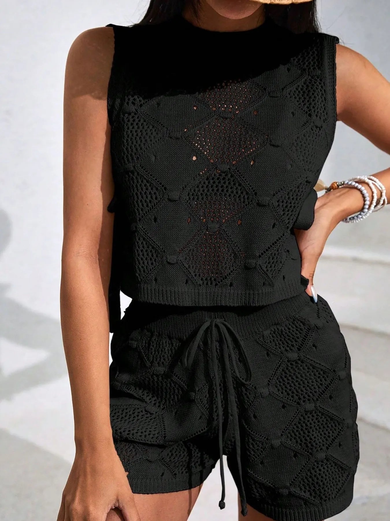 Black diamond-pattern knit sleeveless top and drawstring shorts set