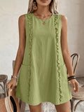 Cedar & Moore Frill Sleeveless Round Neck Dress in light green with ruffle trim and pockets.