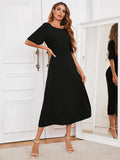 Black round-neck cutout half-sleeve midi dress, fitted bodice and flared skirt