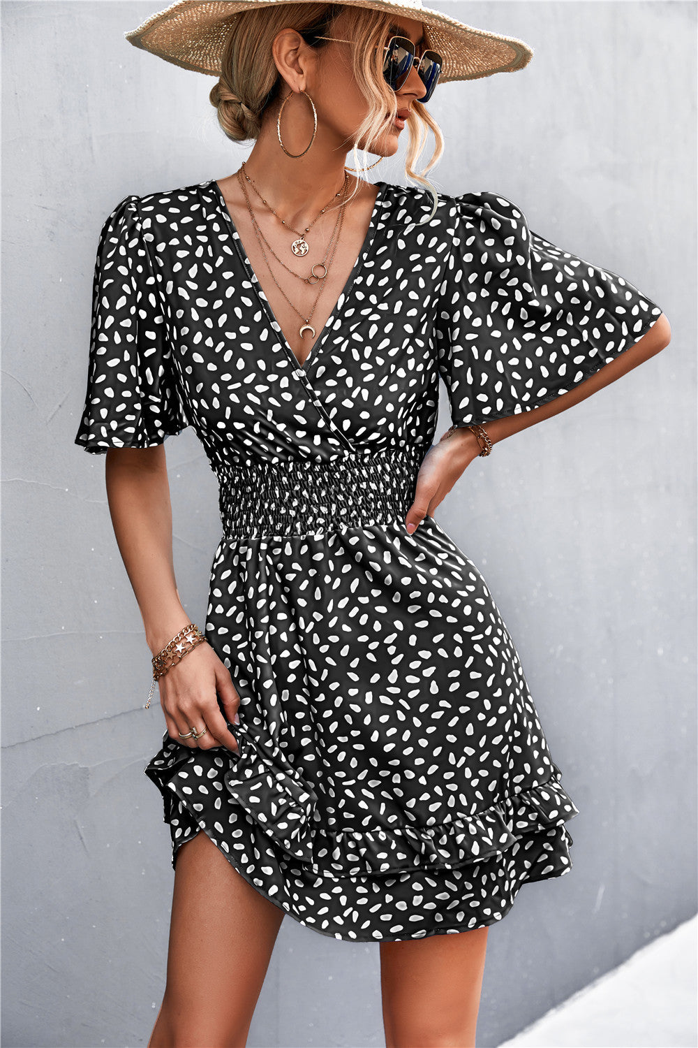 Black printed smocked-waist surplice layered dress with short flutter sleeves