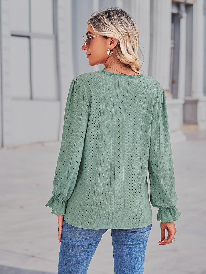 Gum leaf green eyelet V-neck blouse from back view with flounce sleeve detail