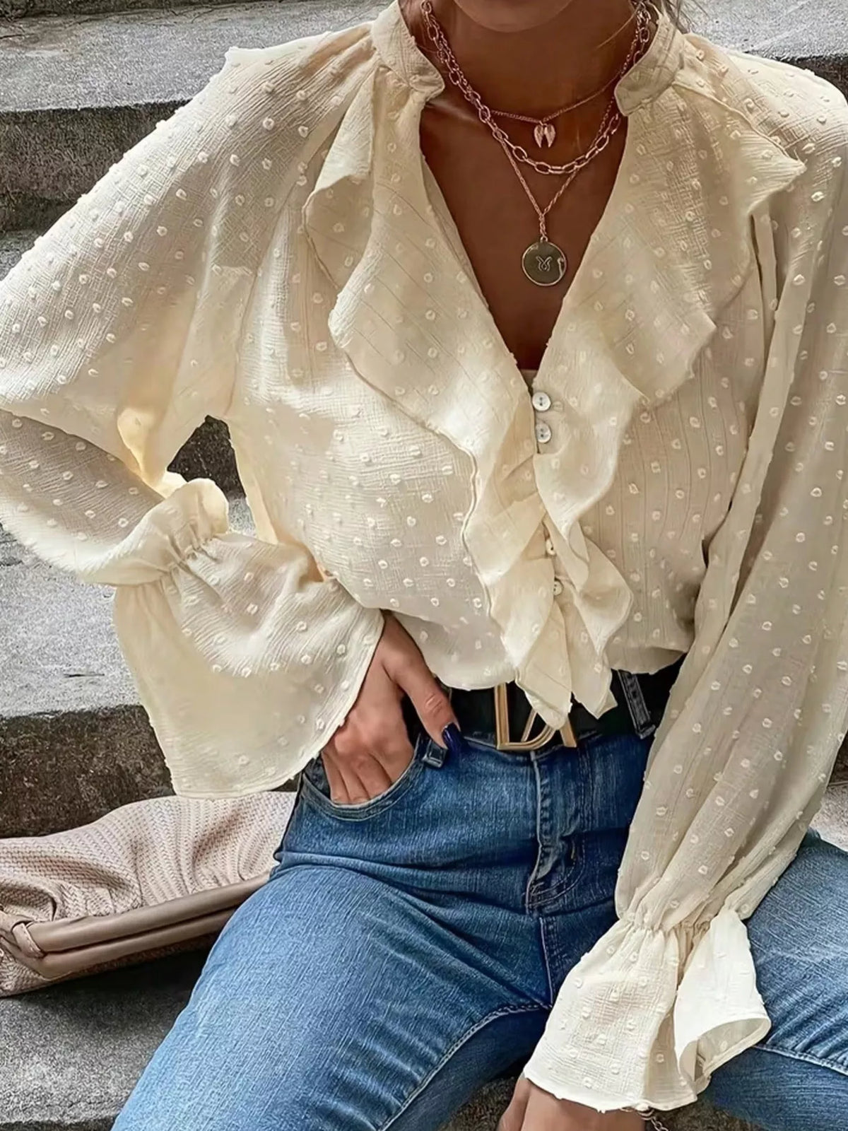 Beige Swiss-dot blouse with front buttons, large ruffle collar, long puff sleeves