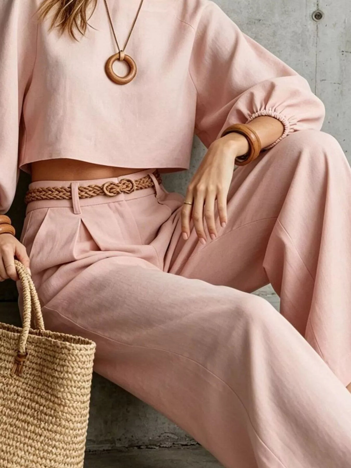 Dusty pink balloon-sleeve crop top with gathered cuffs and matching wide-leg pants