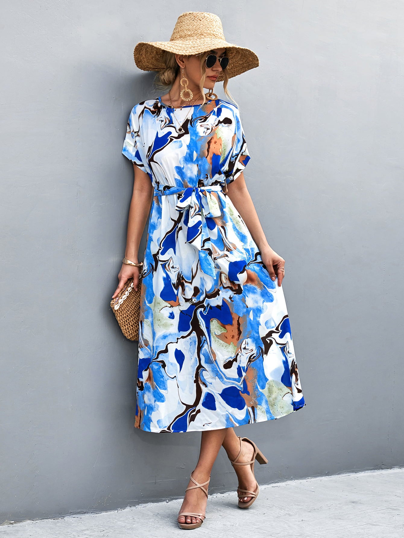 Blue abstract midi tie-waist dress with round neck, short sleeves, and belt tie