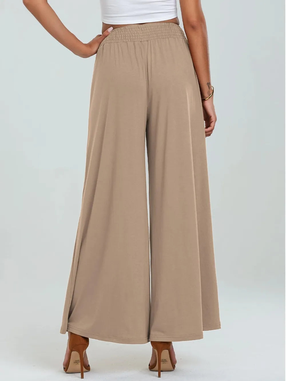 Tan elastic-waist wide-leg pants with side pockets, ankle-length