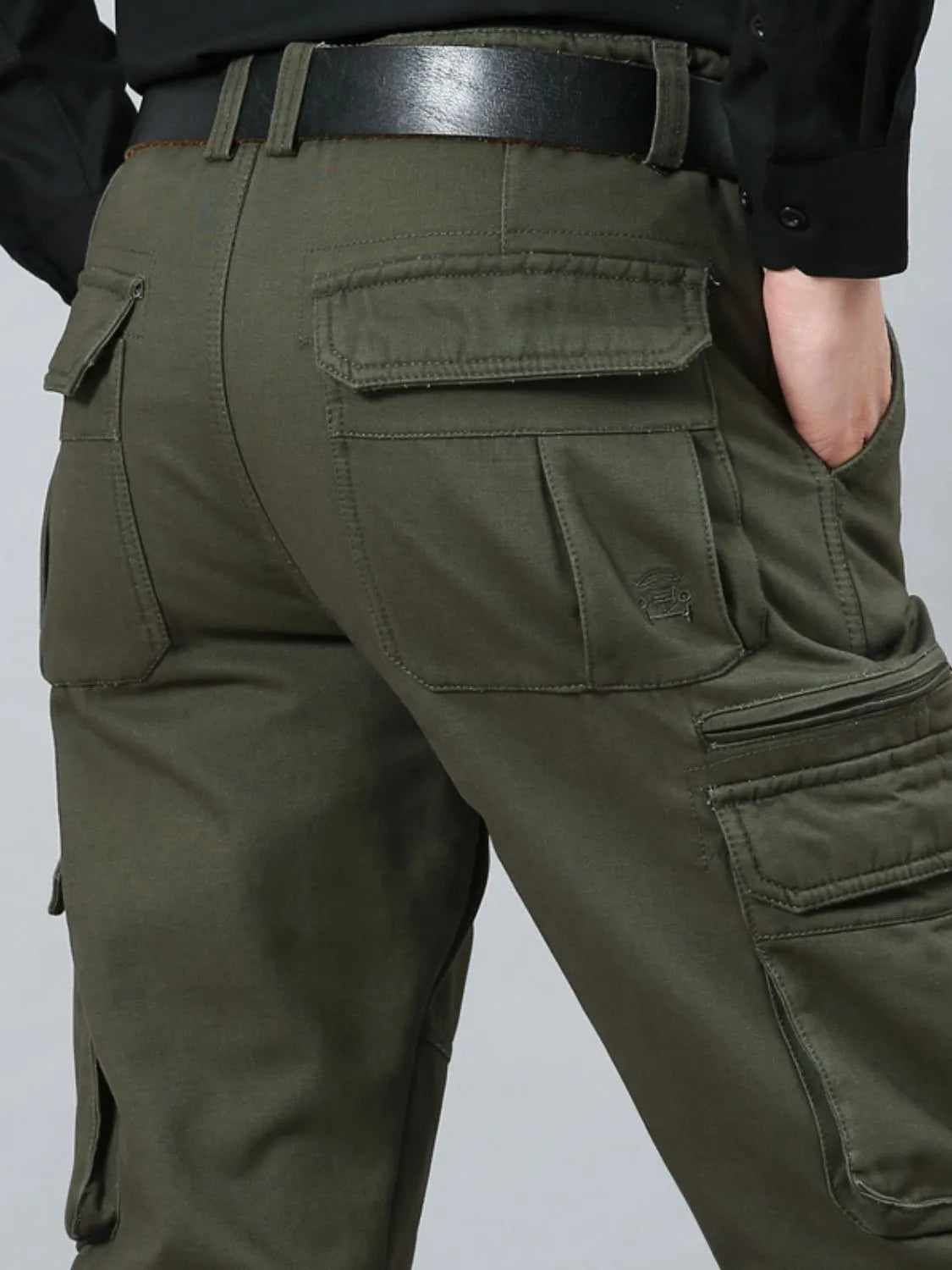 Men's solid cargo pants in army green with back pocket and cargo flap detail