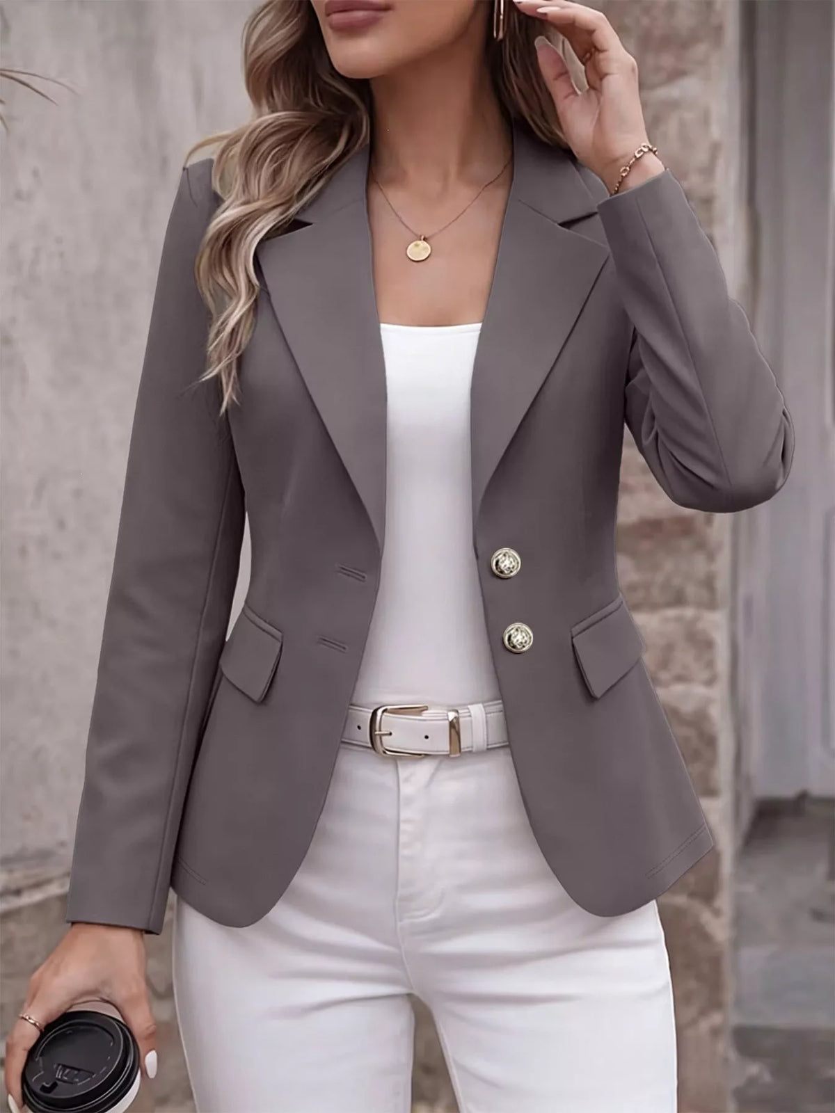 Gray tailored blazer jacket with lapel collar, two-button front, and chest flap pocket