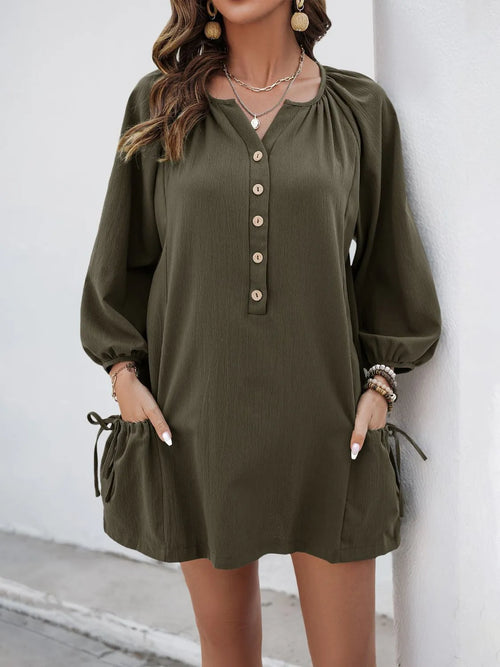 Button-front balloon-sleeve dress in dark olive, with button placket and tie cuffs